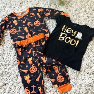 Cute little boy, or a little girl, Halloween holiday matching outfit set.
